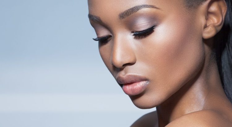 woman with glowing skin that can be achieved by custom chemical peels